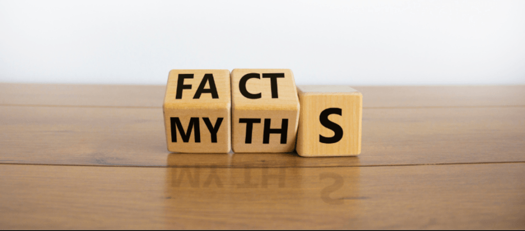 Dice with the words 'Facts' and 'Myths' symbolizing the process of distinguishing truth from misconceptions in college admissions.