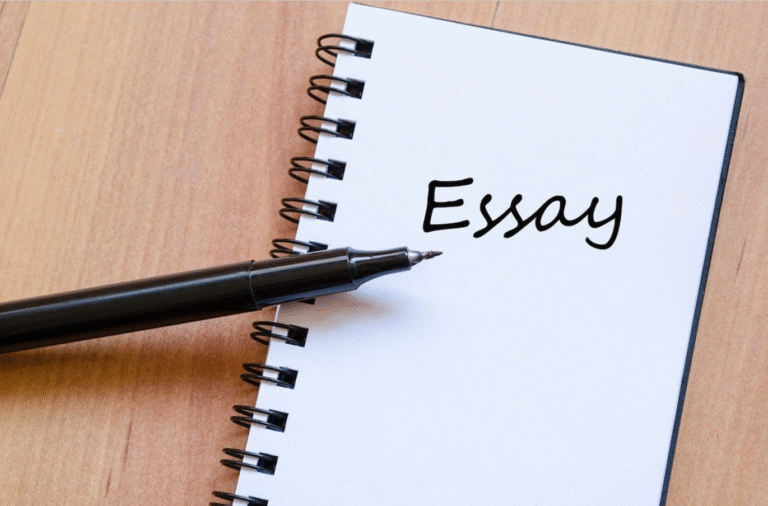 Student preparing for GRE Analytical Writing with focused study and structured notes.